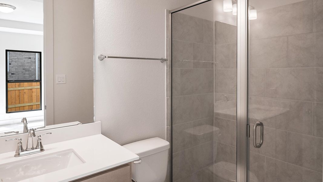 Furnished interior view inside a new home in 6 Creeks, Kyle (Image 8).