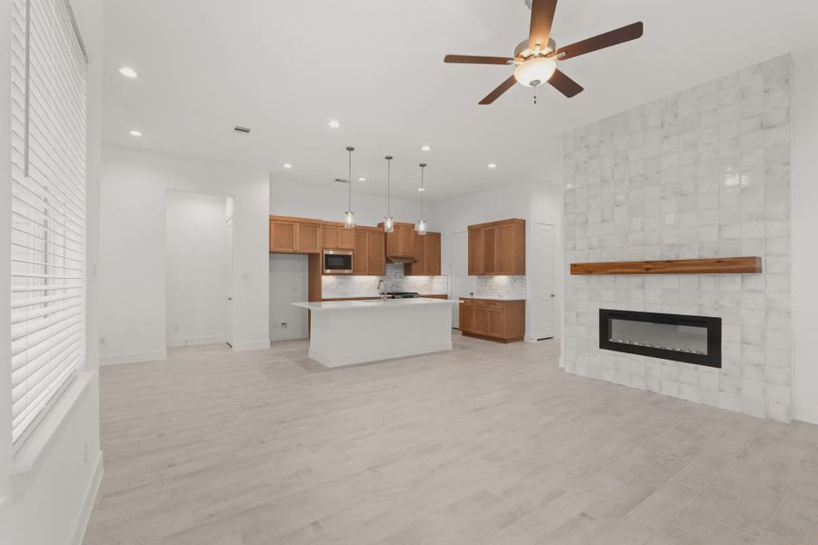 Representative furnished interior of a home built from the Mickelson by Chesmar Homes in Riceland Alley Loads, Mont Belvieu (Image 59).