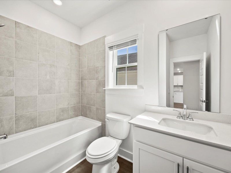 Furnished interior view inside a new home in The Coves at Lakes of Cane Bay, Summerville (Image 4). Furnished interior view inside a new home in The Coves at Lakes of Cane Bay, Summerville (Image 4).