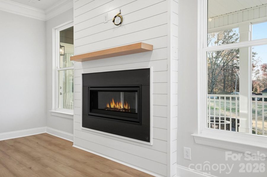 Cosmo gas fireplace with shiplap feature wall
