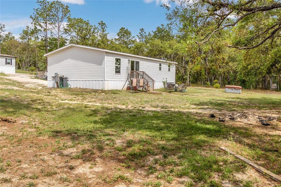 Exterior details and patio area of a home in , Homosassa Springs (Image 20).