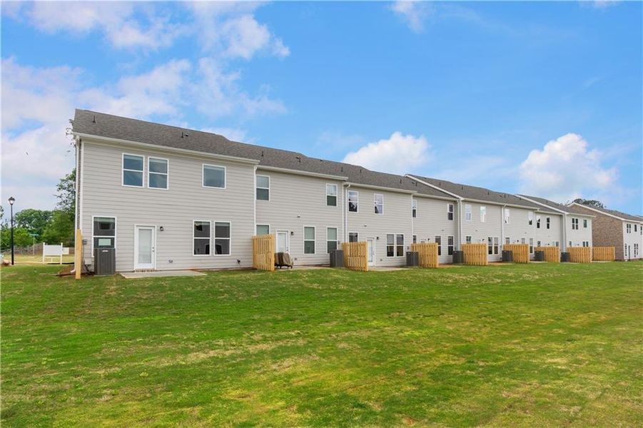 Exterior details and patio area of a home in Avery Landing, McDonough (Image 24).