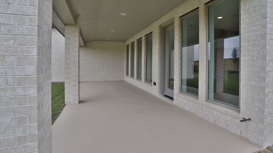 Exterior details and patio area of a home in Legacy Prairie at Katy Court, Katy (Image 3).