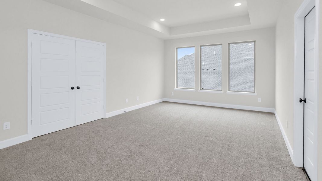 Spacious, unfurnished interior of a new home in Legacy Prairie at Katy Court, Katy (Image 28).