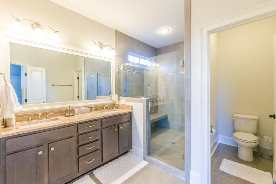 Representative furnished interior of a home built from the Claremont by Bill Clark Homes in The Sanctuary at Sunset Beach, Sunset Beach (Image 60). Representative furnished interior of a home built from the Claremont by Bill Clark Homes in The Sanctuary at Sunset Beach, Sunset Beach (Image 60).