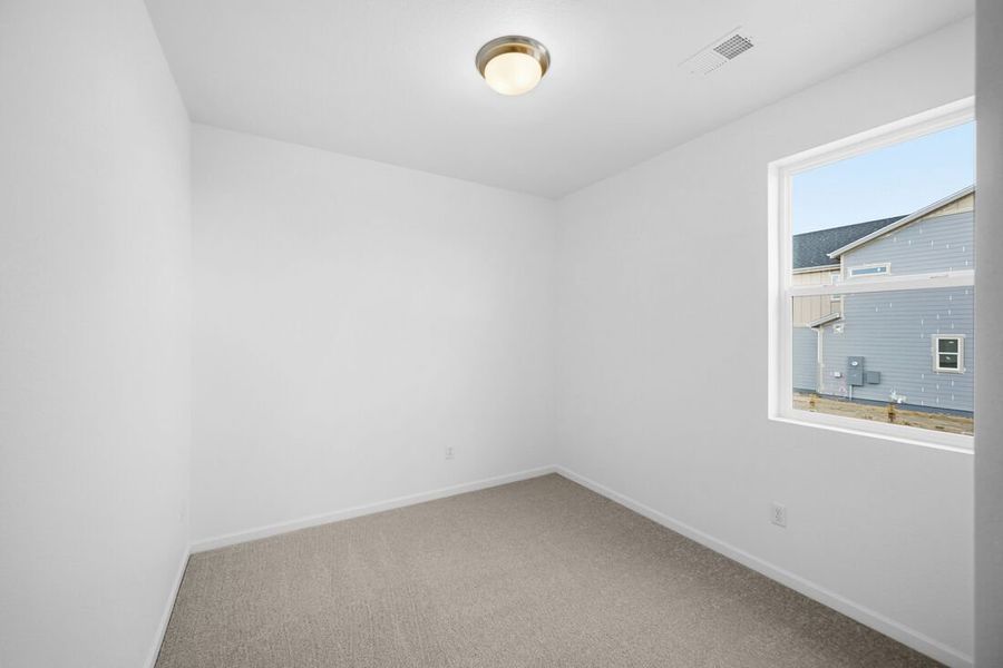 Spacious, unfurnished interior of a new home in Trailstone, Arvada (Image 22).
