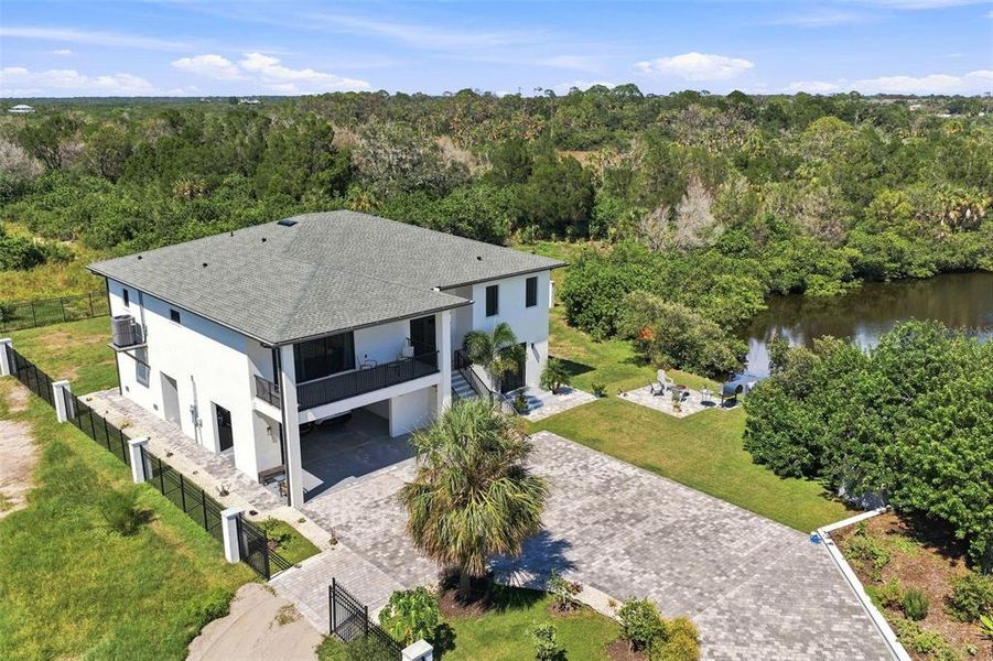 Front exterior of a new home in , Port Richey, FL, highlighting curb appeal (Image 25).
