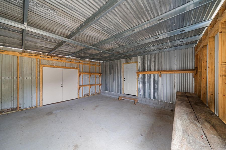 Designed with low-maintenance metal siding to match the main home, this structure is as practical as it is flexible.