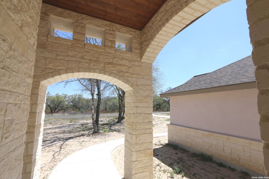 Exterior details and patio area of a home in , Floresville (Image 20).