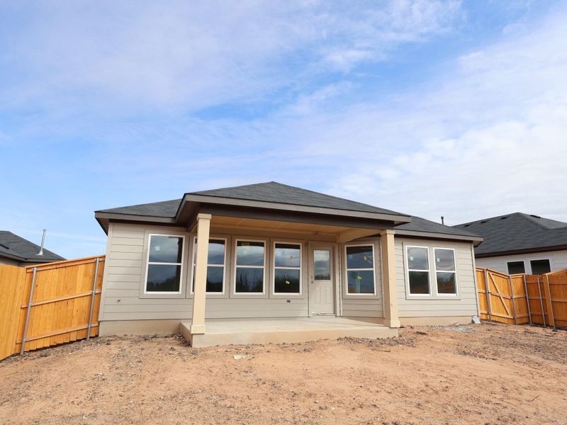 Exterior details and patio area of a home in Carillon, Manor (Image 3).