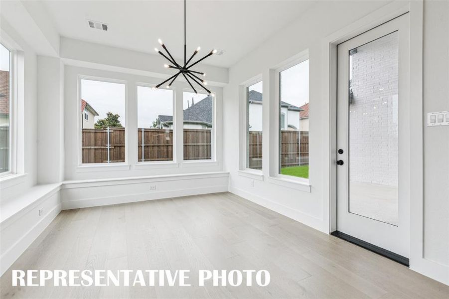 Grand dinner parties are in your future in this wonderful, light filled dining room!  REPRESENTATIVE PHOTO.