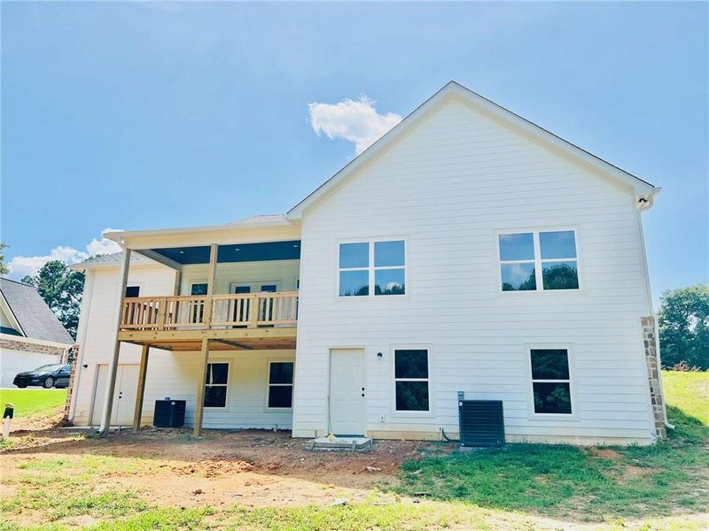 Front exterior of a new home in , Taylorsville, GA, highlighting curb appeal (Image 1).