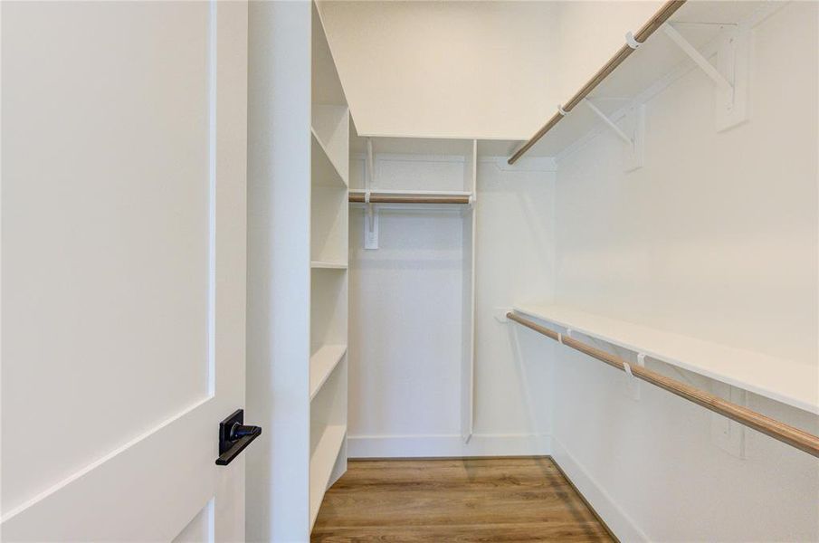 Full-sized walk-in closet for Bedroom 3.