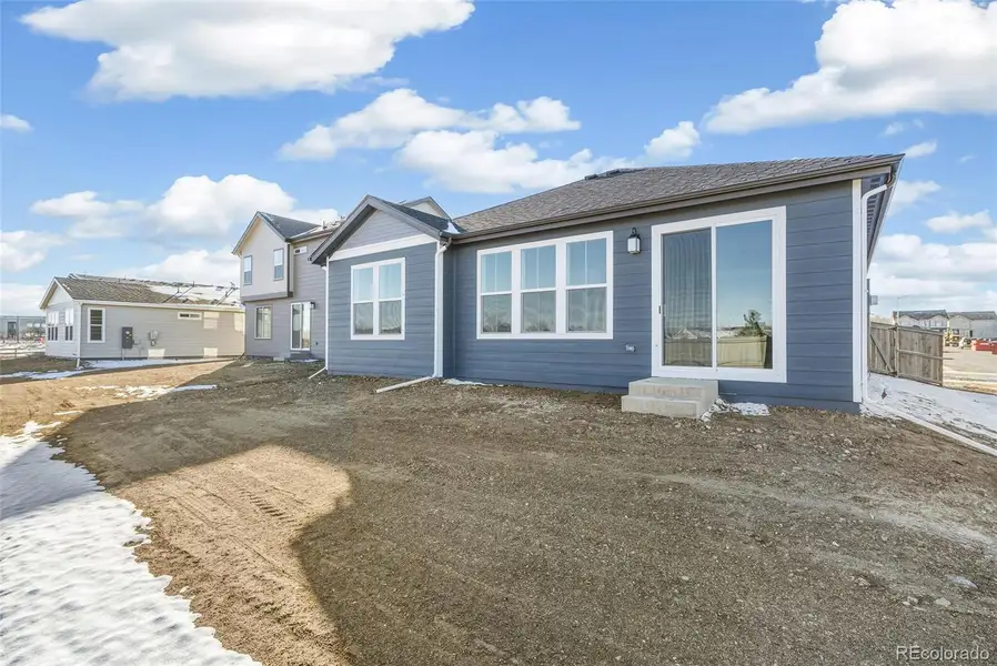 Exterior details and patio area of a home in The Nest Classic at Canyon Creek, Erie (Image 3).