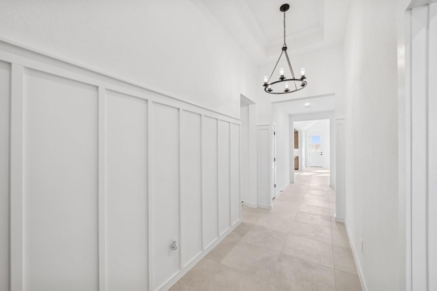 Welcoming foyer with feature wall