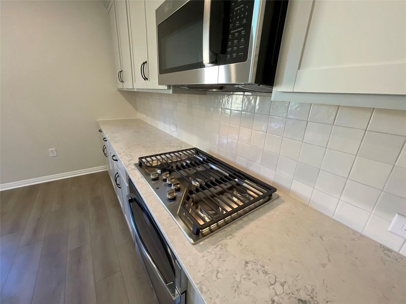 Furnished interior view inside a new home in Covered Bridge, Hutto (Image 3). Furnished interior view inside a new home in Covered Bridge, Hutto (Image 3).