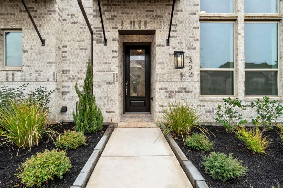 Exterior details and patio area of a home in Woodforest, Montgomery (Image 4).