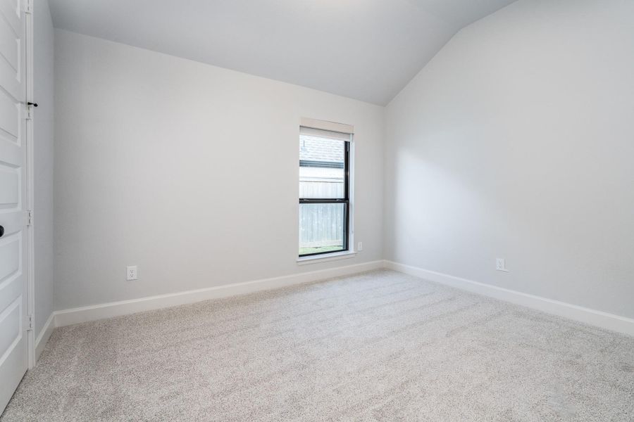 Third secondary bedroom shows as brand new, just like the rest of the home! Owner has upgraded carpet, pad and tile throughout this home. Third secondary bedroom shows as brand new, just like the rest of the home! Owner has upgraded carpet, pad and tile throughout this home.