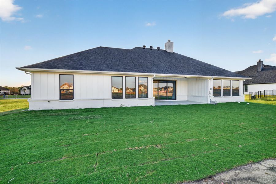 Exterior details and patio area of a home in Paloma Ranches, Justin (Image 3).