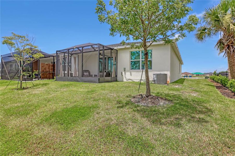 Exterior details and patio area of a home in The Timbers at Everlands, Palm Bay (Image 26).
