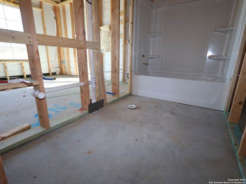 In-progress construction of a new home in Chaparral Ranch, Floresville, TX (Image 25).