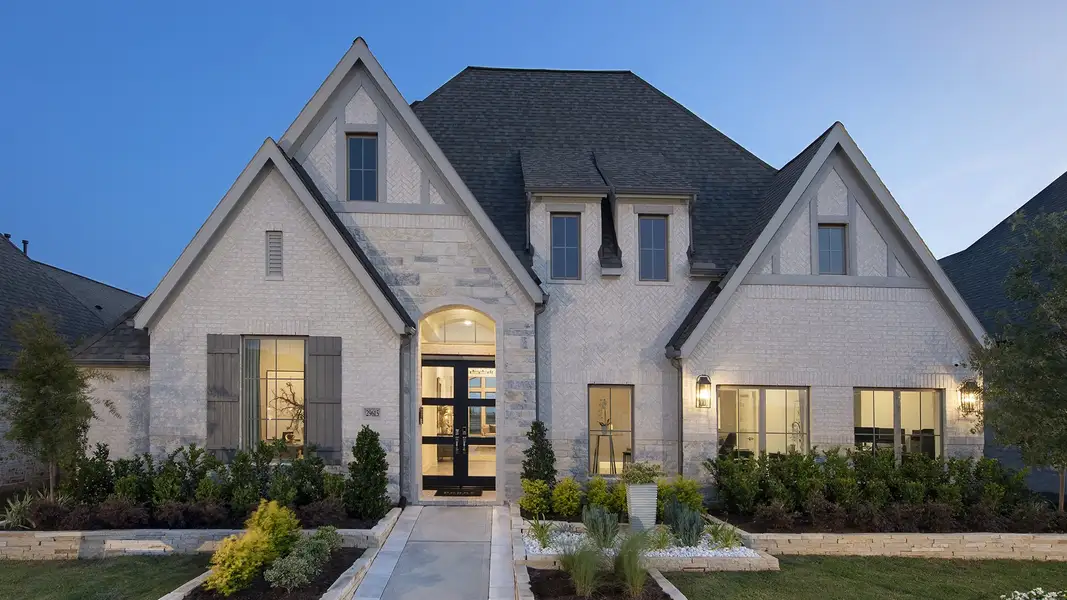 Front exterior of a new home in Kinder Ranch, San Antonio, TX, highlighting curb appeal (Image 2).