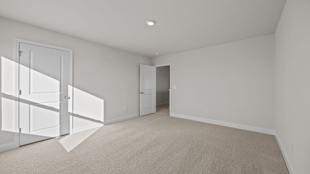 Spacious, unfurnished interior of a new home in Beaver Dam Crossing, Bailey (Image 27). Spacious, unfurnished interior of a new home in Beaver Dam Crossing, Bailey (Image 27).