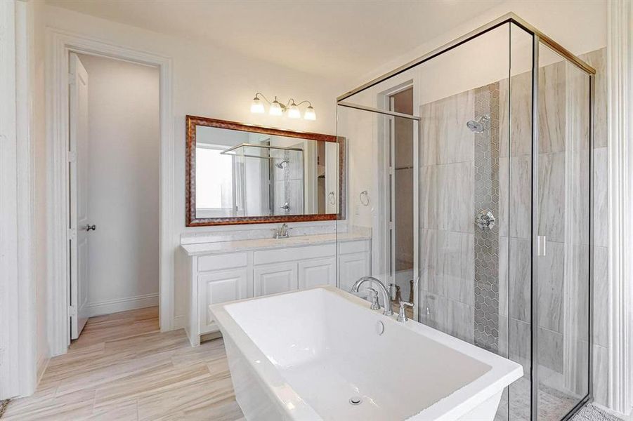 Another view of the Primary Bathroom showcasing the second vanity and a good sense of the size of the shower. Absolutely stunning!