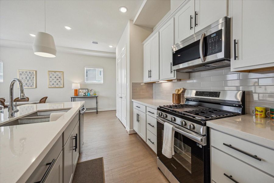 Representative photo showing the community’s model home kitchen. Layout and selections may vary.