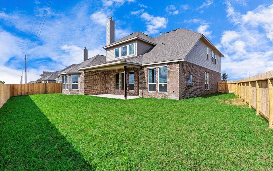 Exterior details and patio area of a home in High Park Hill, Arrington (Image 4).