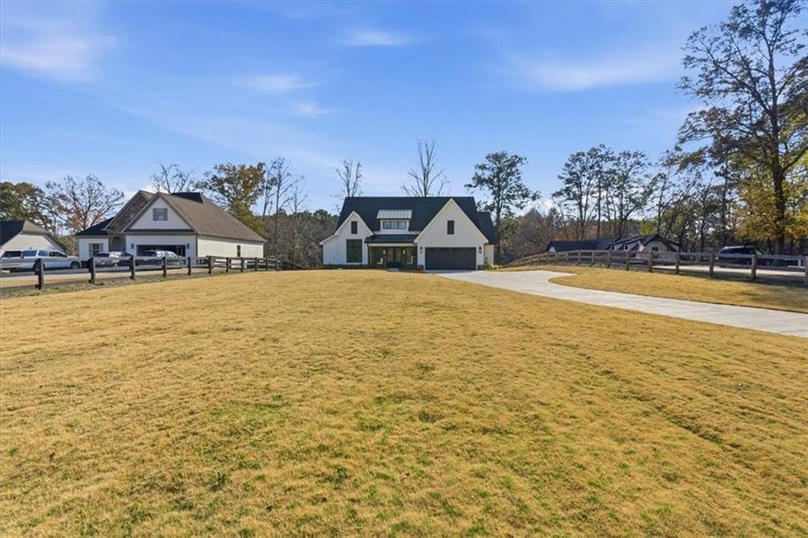 Front exterior of a new home in , Cartersville, GA, highlighting curb appeal (Image 1).