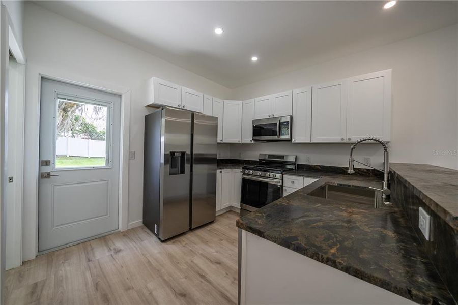 Furnished interior view inside a new home in , Williston (Image 6).