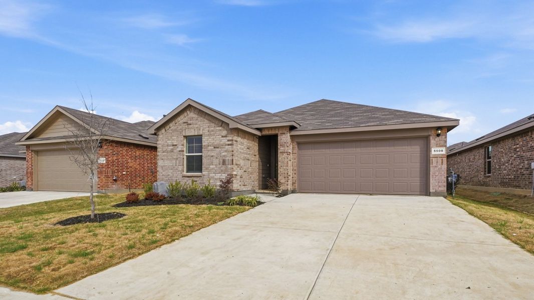Representative exterior photo of a completed home built from the Caden by D.R. Horton in Hickory Grove, Krum, TX (Image 2).