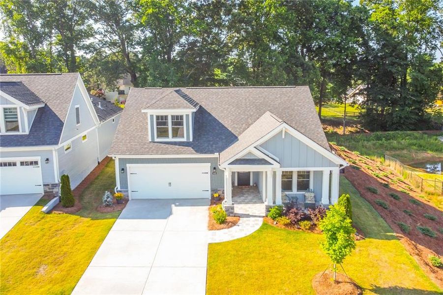 Front exterior of a new home in , Dacula, GA, highlighting curb appeal (Image 25).