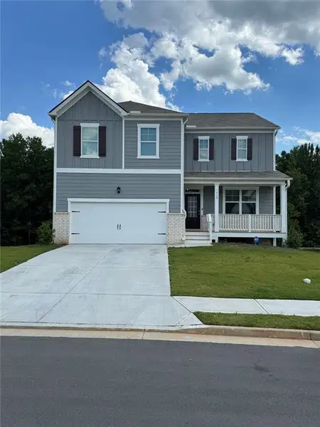 Front exterior of a new home in , Dallas, GA, highlighting curb appeal (Image 26).