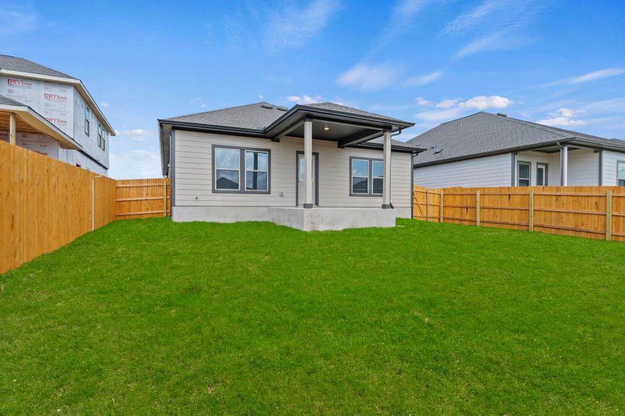Rear of Home and Private Backyard