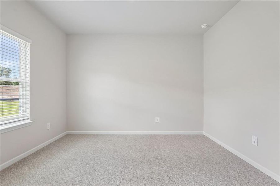 Spacious, unfurnished interior of a new home in Northwoods at Mirror Lake, Villa Rica (Image 51).