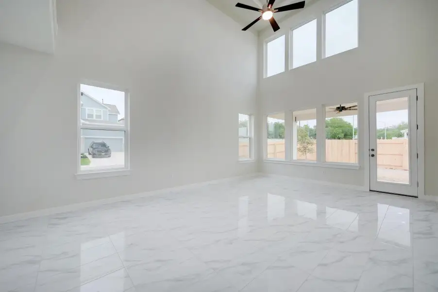 Representative unfurnished interior of a home built from the Travis by Scott Felder Homes in Flora, Hutto (Image 13).