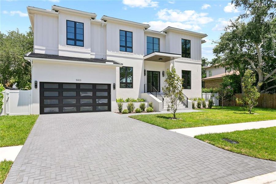 Front exterior of a new home in , Tampa, FL, highlighting curb appeal (Image 1). Front exterior of a new home in , Tampa, FL, highlighting curb appeal (Image 1).