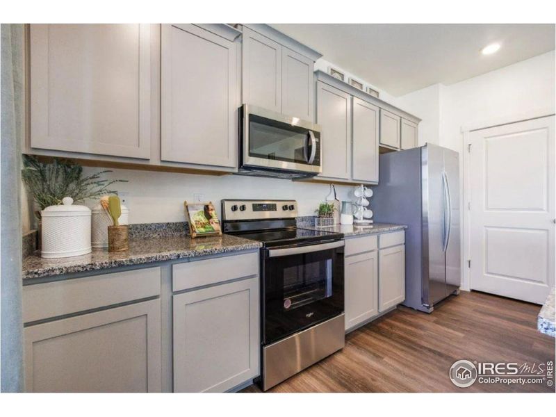 Furnished interior view inside a new home in Fossil Creek Ranch, Windsor (Image 15).