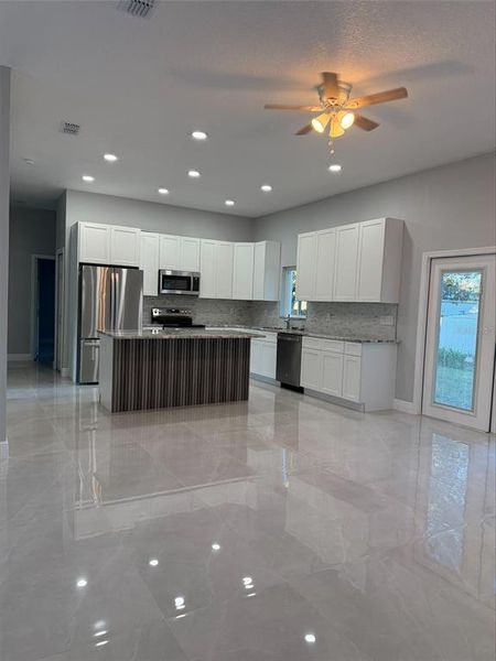 Furnished interior view inside a new home in , Kissimmee (Image 4). Furnished interior view inside a new home in , Kissimmee (Image 4).