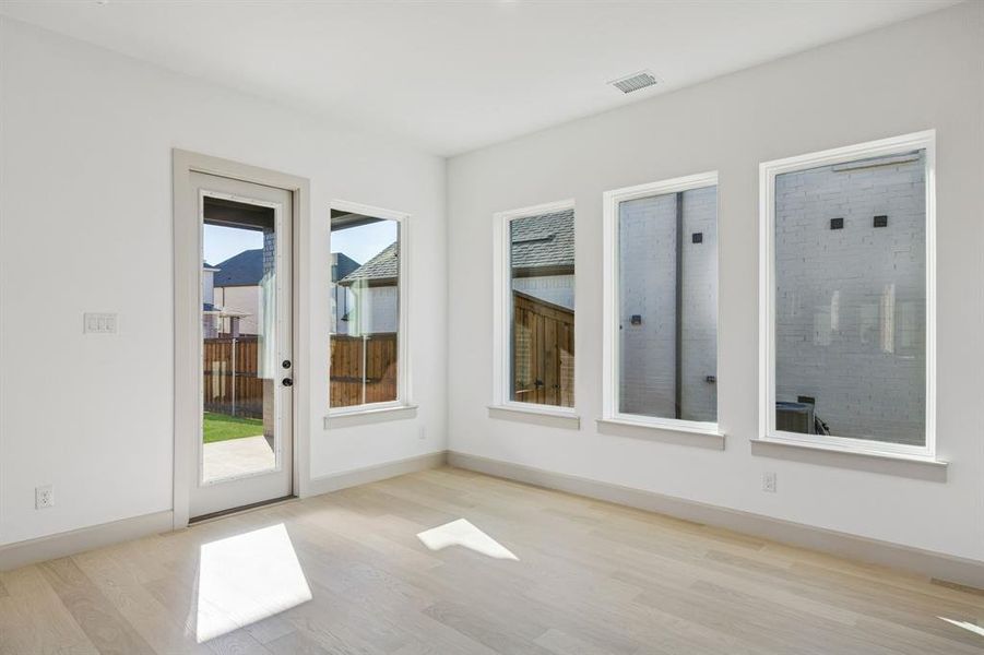 With a spacious dining room and easy access to the lovely covered back patio, it's easy to dine inside or out in this beautiful home.
