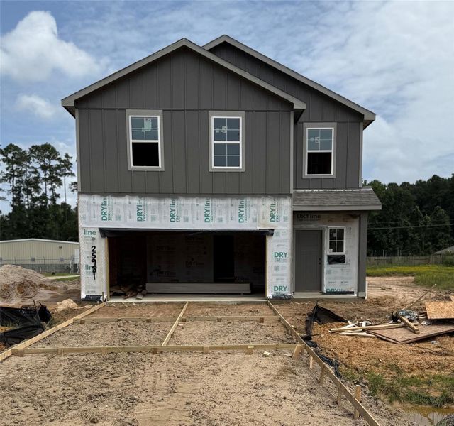 Front exterior of a new home in Liberty Estates, Cleveland, TX, highlighting curb appeal (Image 11).