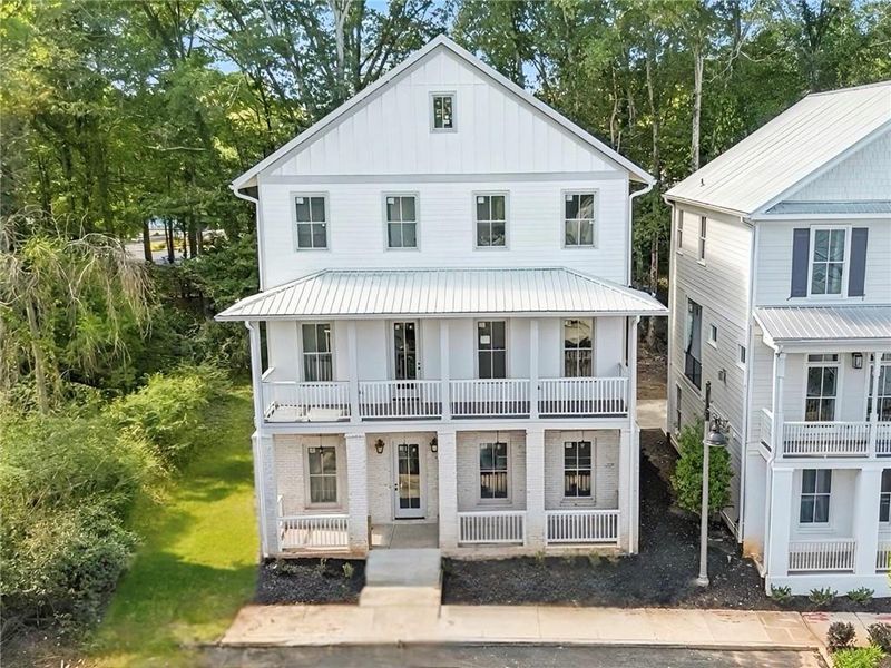 Front exterior of a new home in , Woodstock, GA, highlighting curb appeal (Image 19). Front exterior of a new home in , Woodstock, GA, highlighting curb appeal (Image 19).