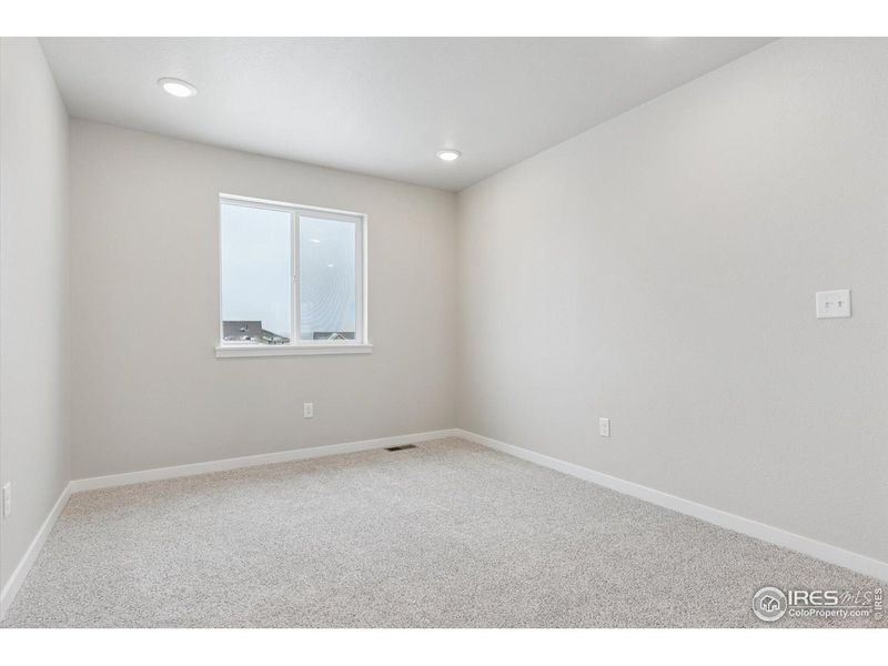 Spacious, unfurnished interior of a new home in The Overlook at Johnstown Farms, Johnstown (Image 22).