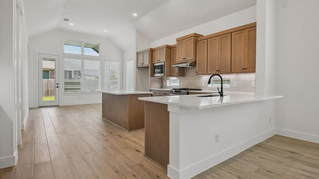 Furnished interior view inside a new home in Artavia, Conroe (Image 5).