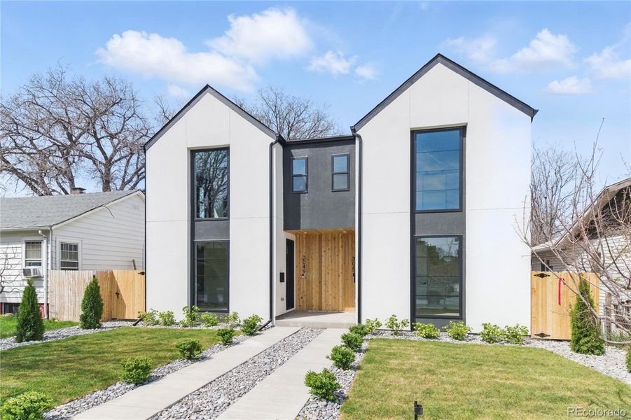 Front exterior of a new home in , Englewood, CO, highlighting curb appeal (Image 29).