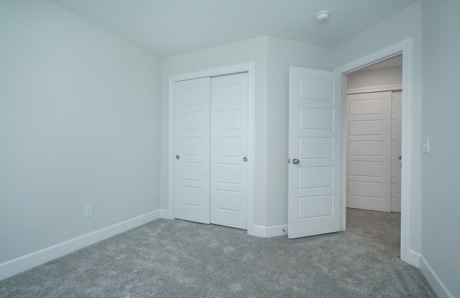 Representative unfurnished interior of a home built from the The Kennedy by Cothran Homes in Holly Ridge, Greenville (Image 35).