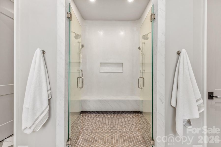 Primary closet with island and washer/dryer hookups