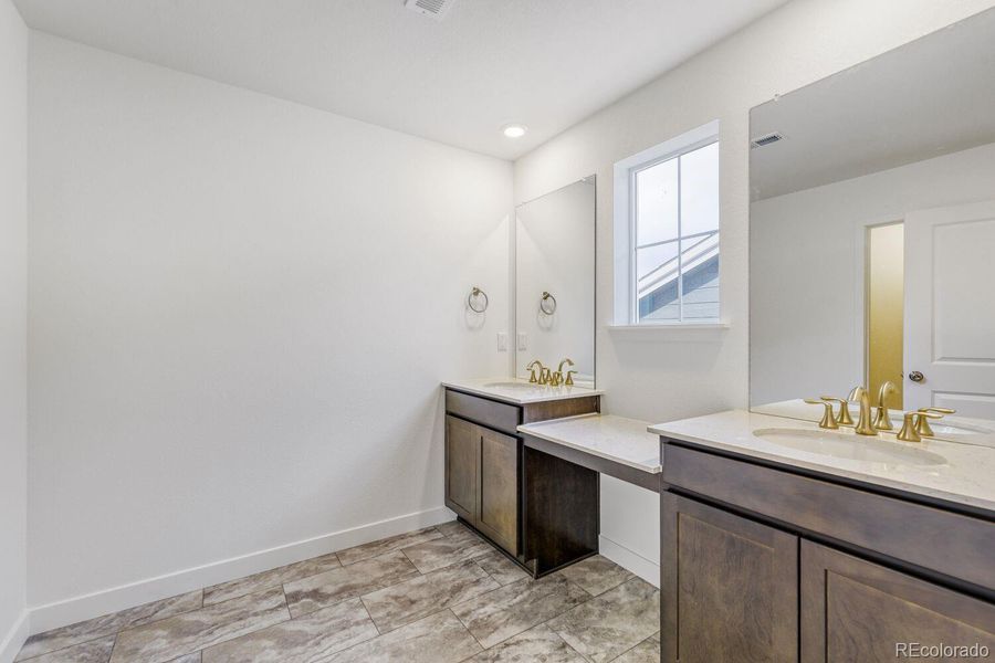 Furnished interior view inside a new home in Newlin Crossing, Parker (Image 4).